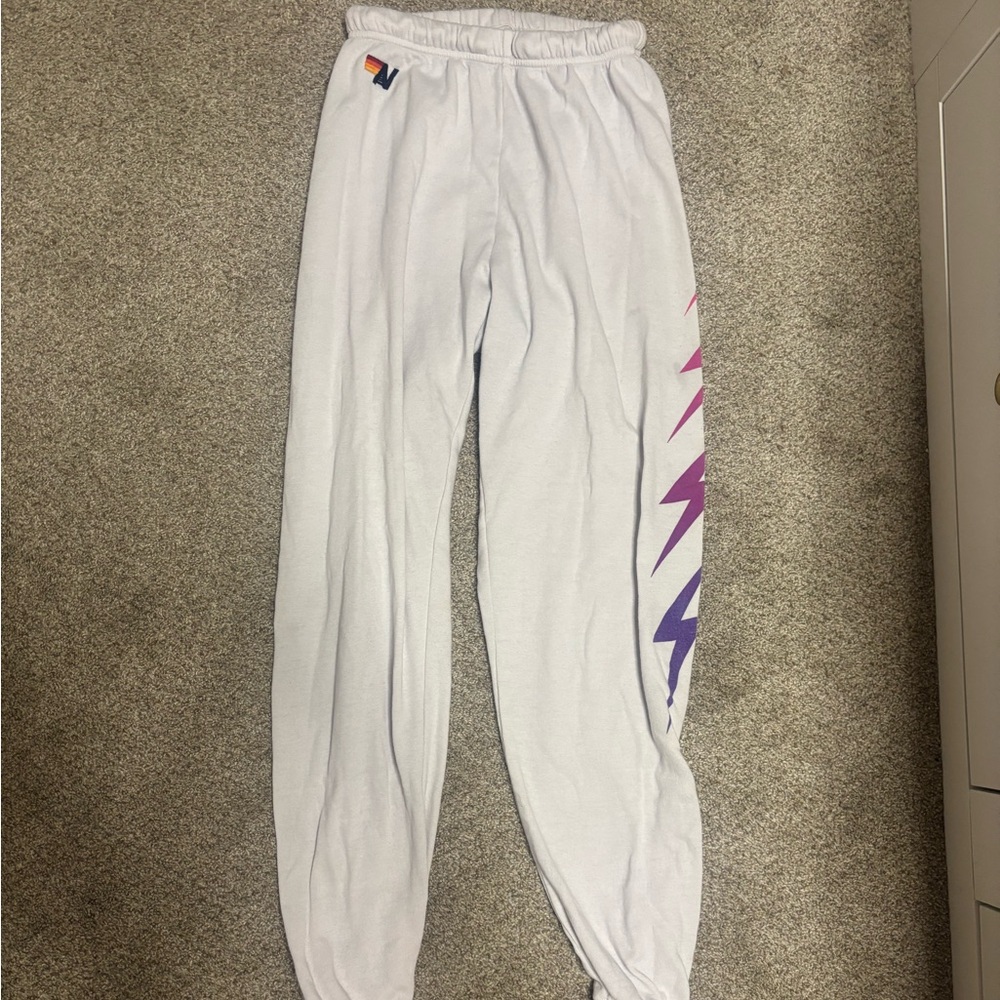 Aviator Nation White Sweatpants with Pink and Purple Bolts
